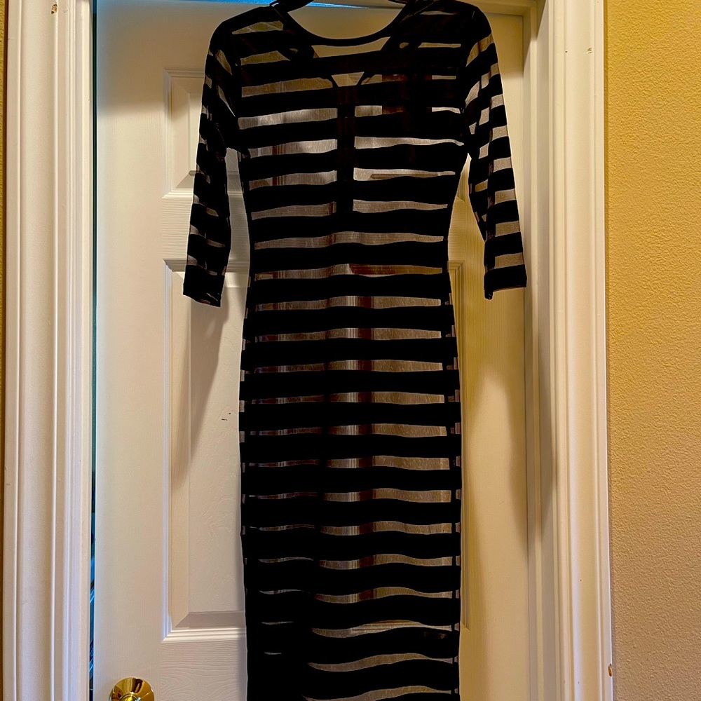 A sexy sheer striped midi dress from Naked Wardrobe.  I’m finally letting it go.